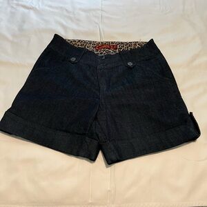 Dark blue denim shorts. Excellent used condition. Size 12.